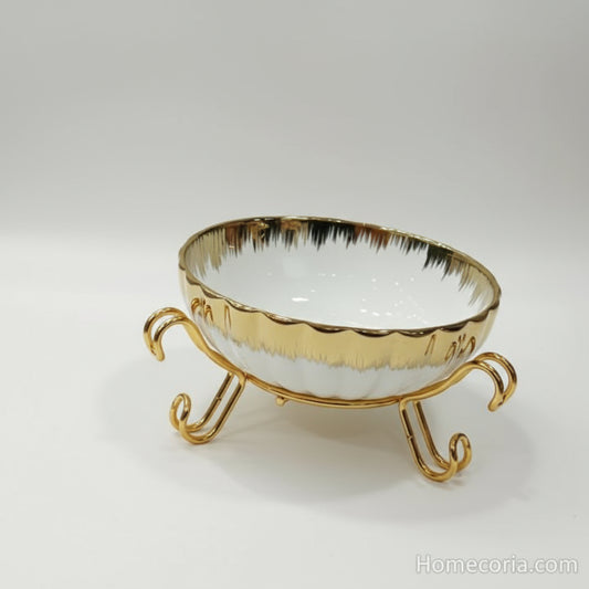 Ceramic bowl with golden stand